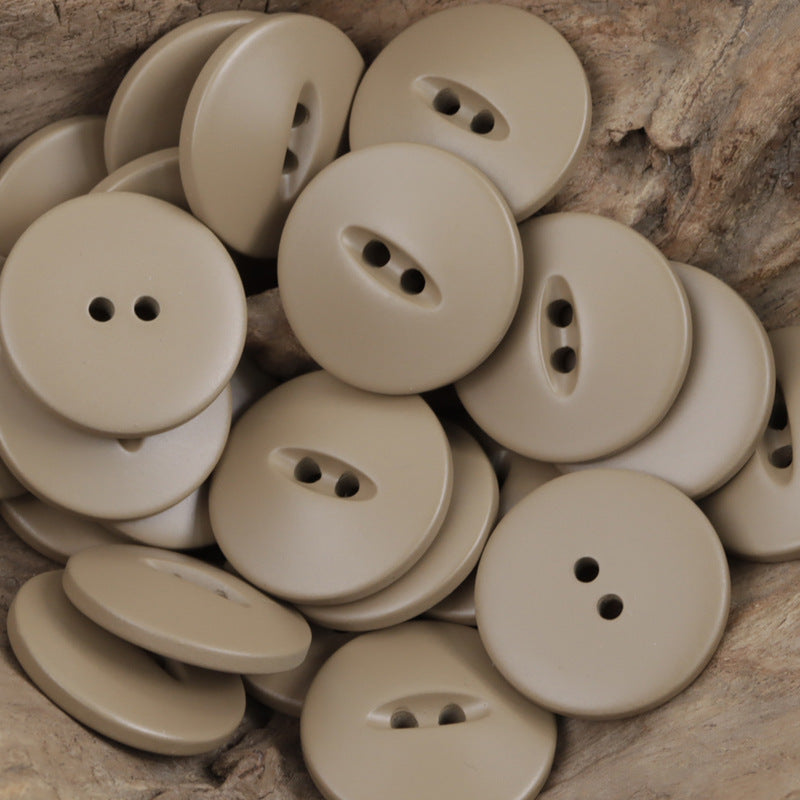 Beige/taupe 30mm matte fish-eye resin buttons with two-hole shanks