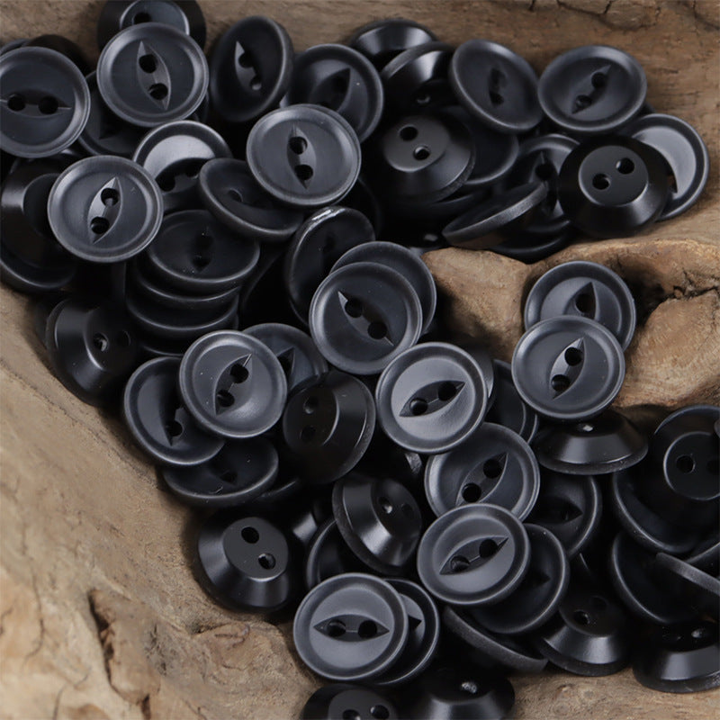 Black fish-eye resin buttons, four-hole, glossy, round faces