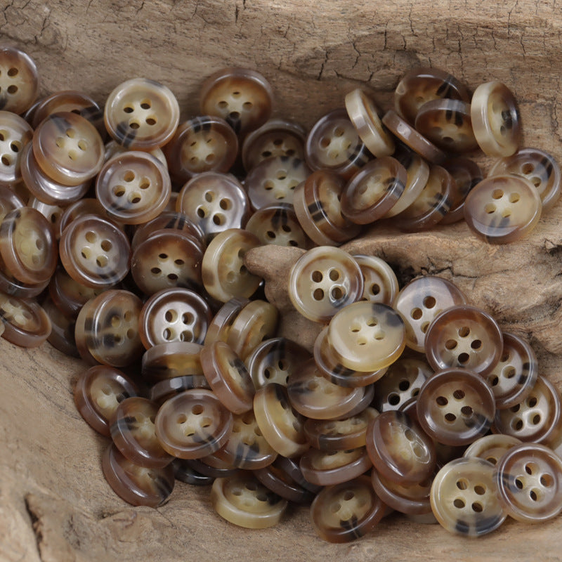 Coffee brown fish-eye resin buttons, four-hole, glossy, round faces