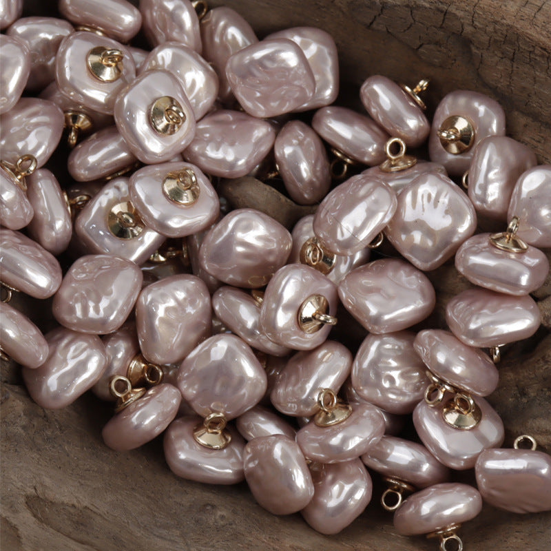 Light pink square resin buttons with gold metal shanks