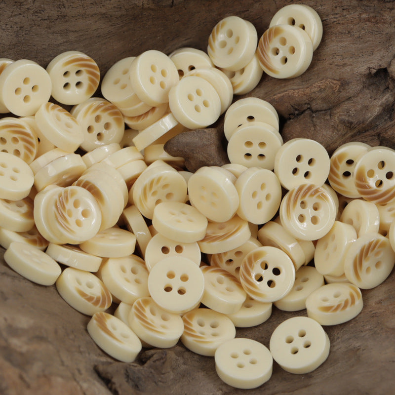 Cream resin buttons with arc stripes, 4 holes, 11.5mm