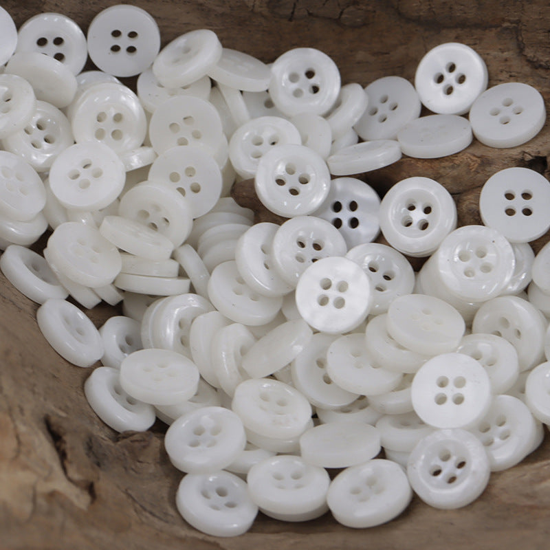 11.5mm round 4-hole resin buttons, all white, speckled finish