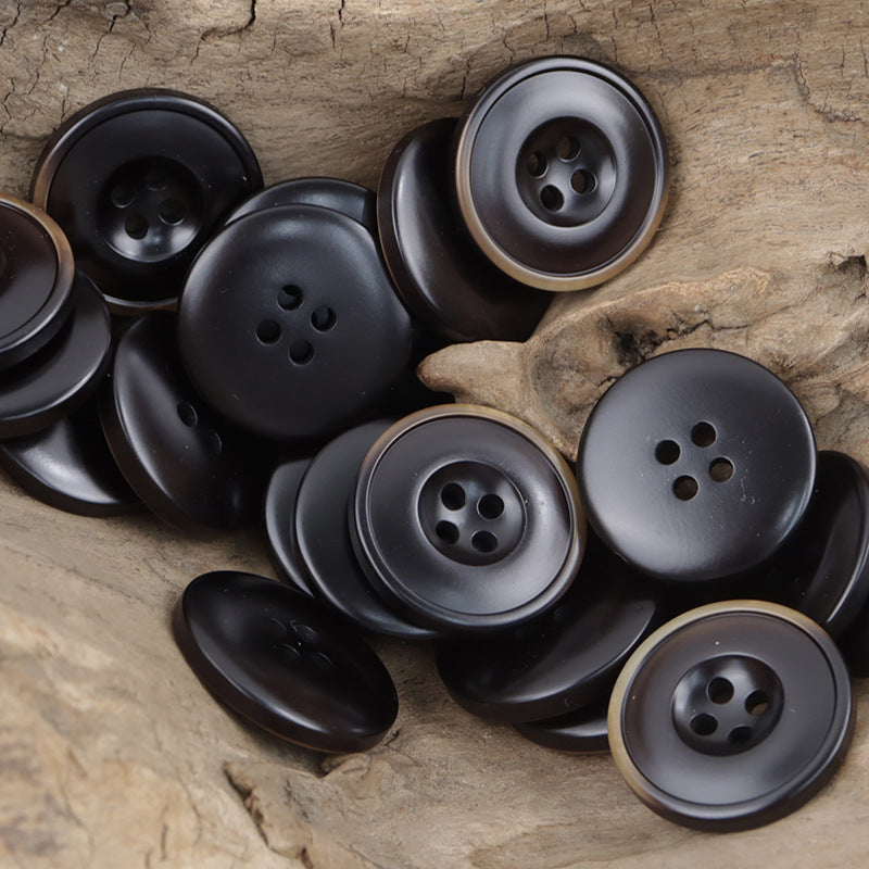 Vintage resin buttons, 4-hole, blackish tones with light edge