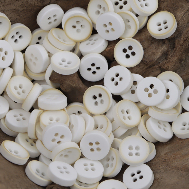 Assorted white round resin buttons with 4 holes, 11.5mm
