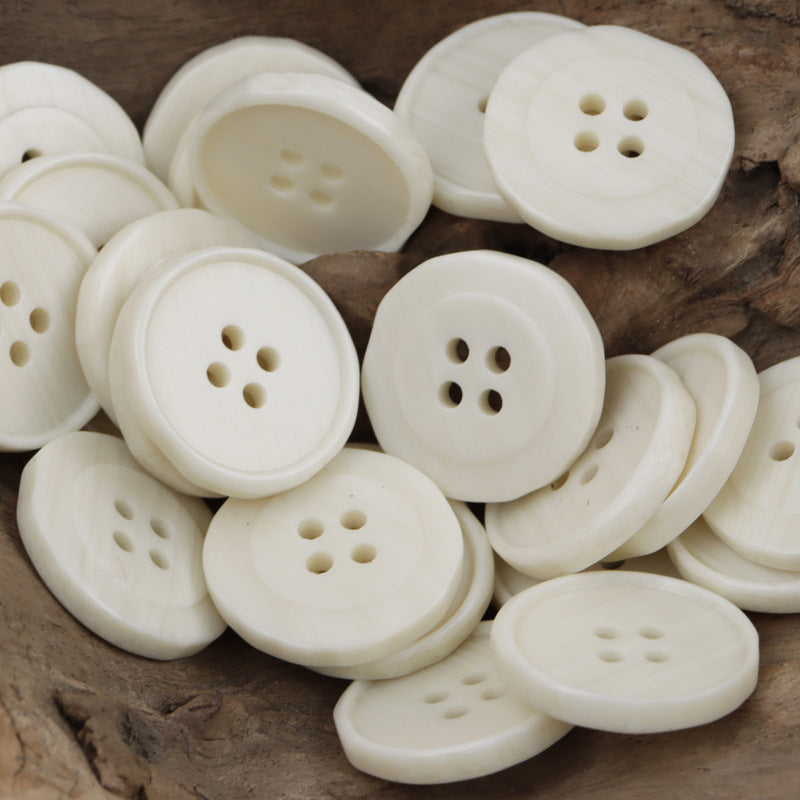 White resin buttons, round with four holes, bulk set