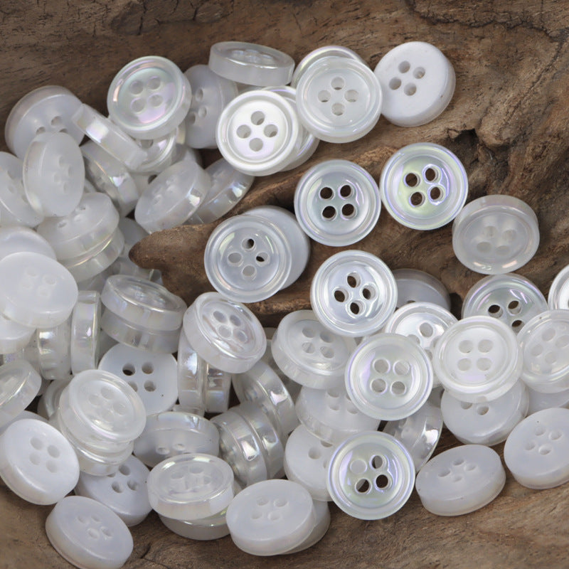 11.5mm round resin buttons with four holes in bright white, multiple pieces