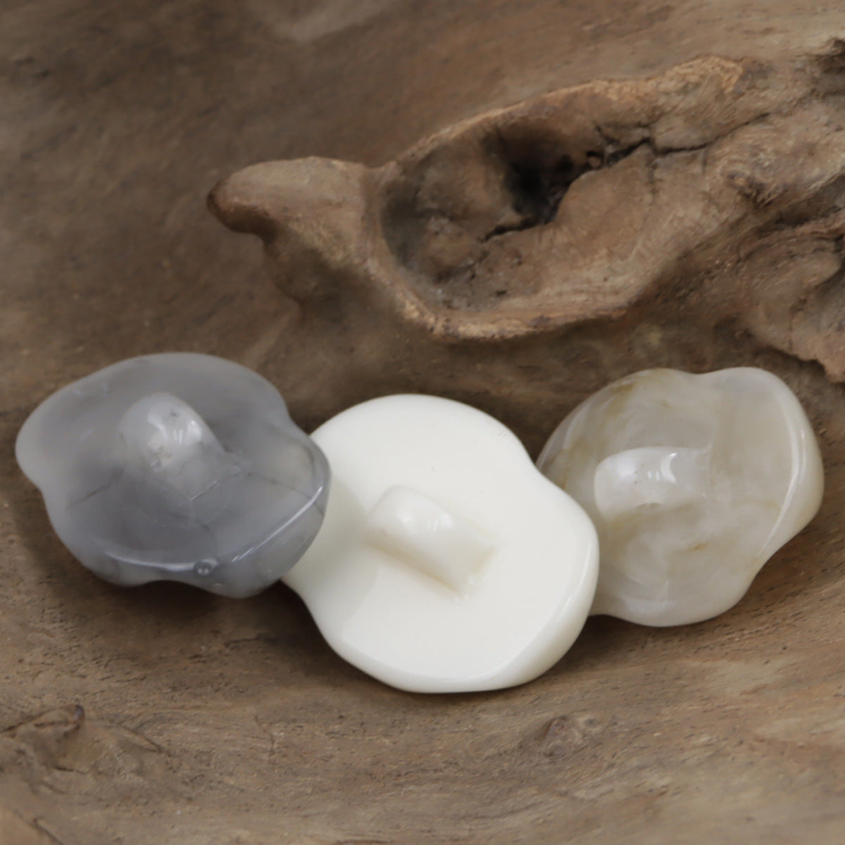 Translucent resin jade-texture buttons in gray, white, and beige; irregular shapes, holes
