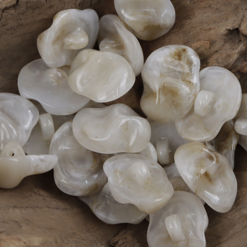 Off-white and beige translucent resin jade-texture buttons, irregular heart-like shapes