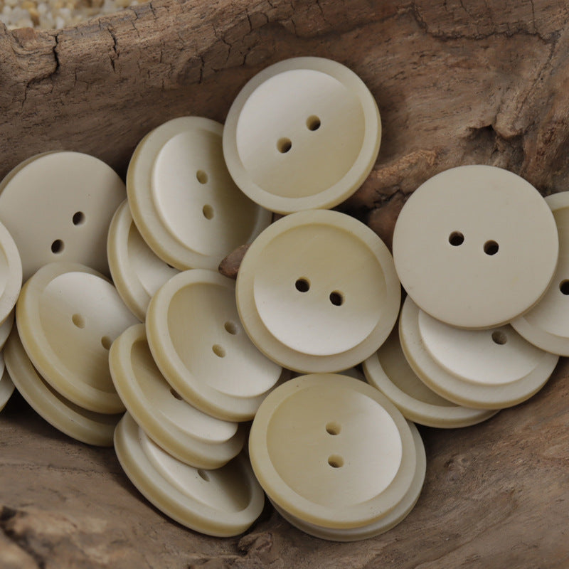Cream round two-hole resin coat buttons, multiple pack