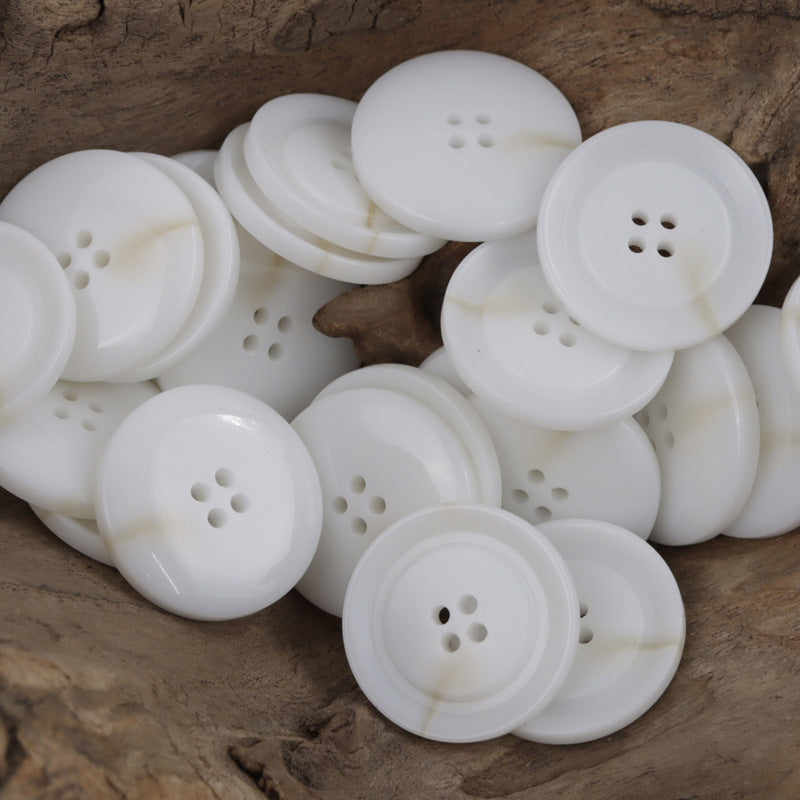 White resin buttons, round 4-hole design, smooth glossy finish