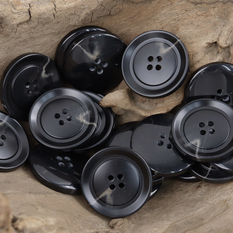 Black resin buttons with gray edging, round 4-hole centers, glossy finish