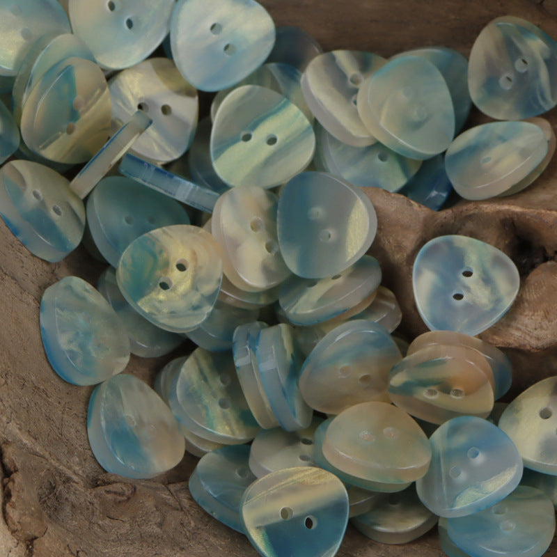 Iridescent triangle resin buttons, 2-hole in light cyan and seafoam blue tones