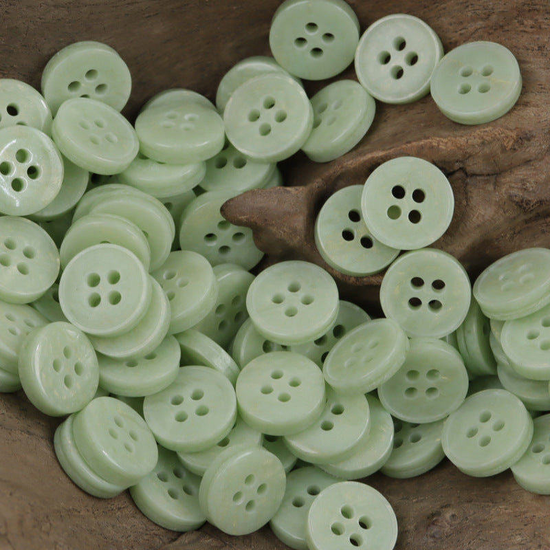 Light green 4-hole resin buttons assortment with varying shades (many shown)