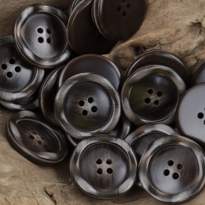 Dark resin buttons, round 4-hole design in brown/black with wood-grain sheen