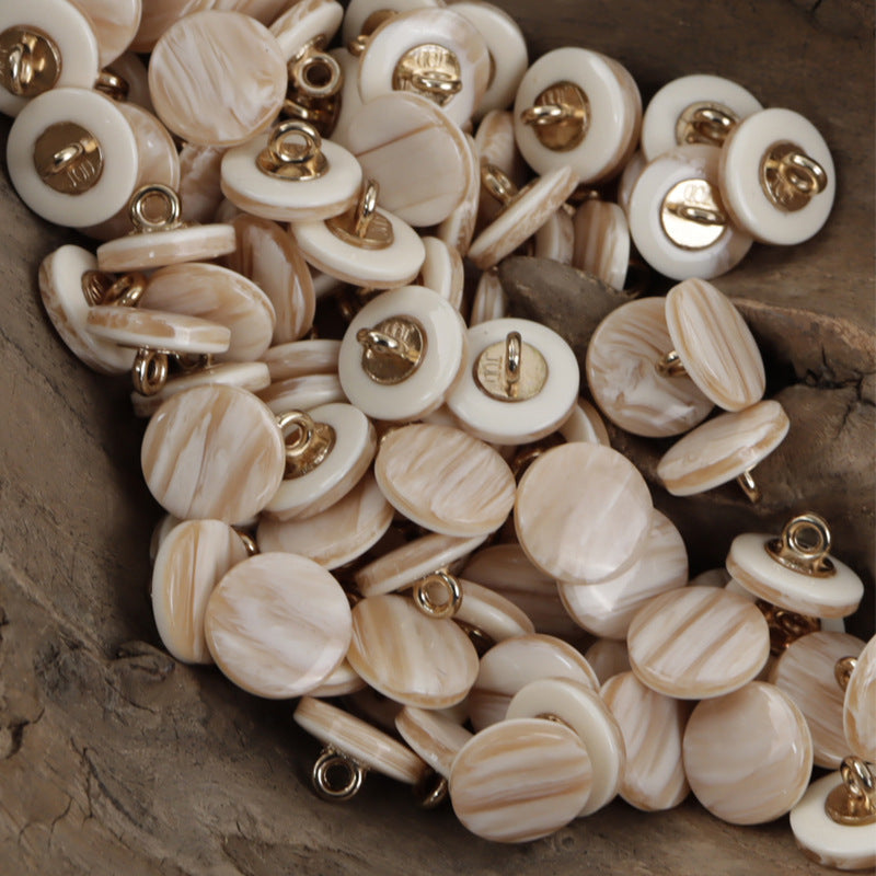 Ivory resin buttons with wood-grain swirl and metal shanks, round 11.5mm