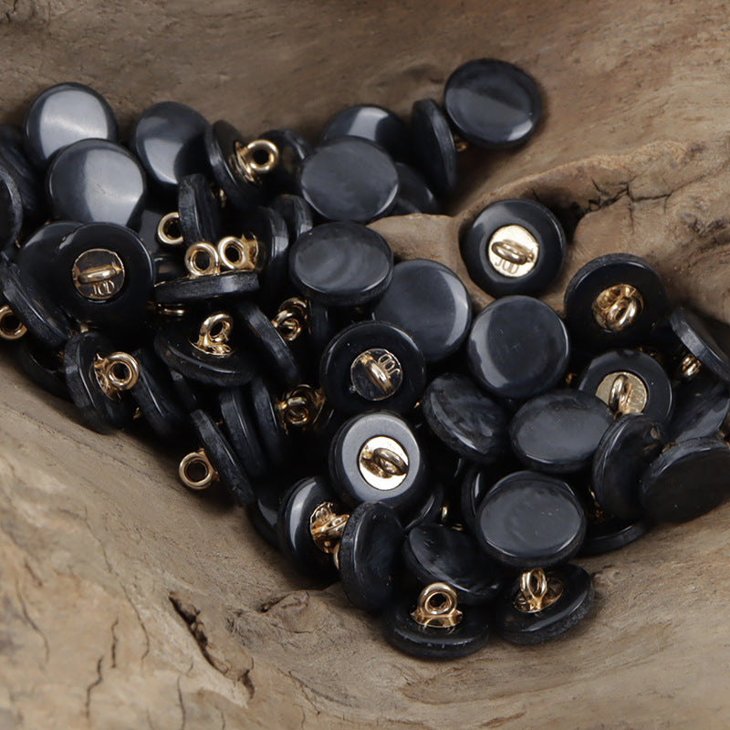 Black resin buttons with wood-grain look and metal shanks, round 11.5mm