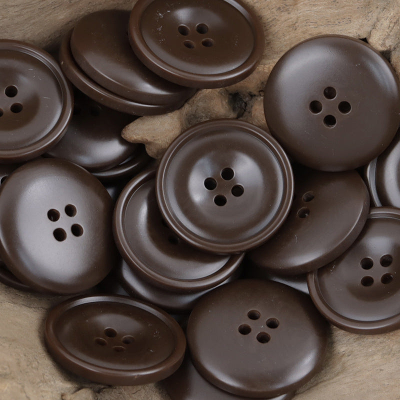 Bulk resin sewing buttons in dark brown/gray, round 4-hole design
