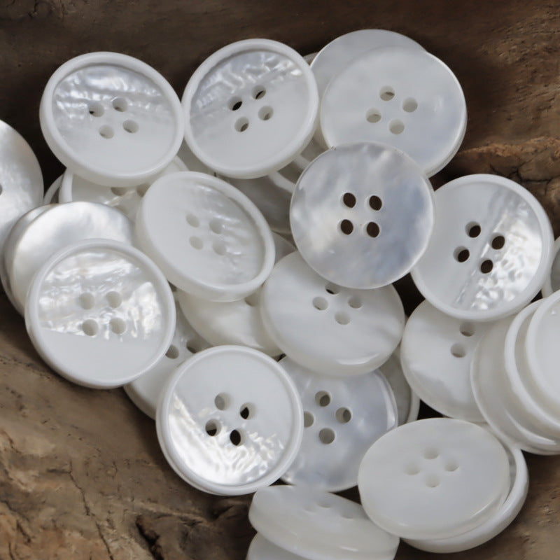White 4-hole resin sewing buttons, round, four-hole design