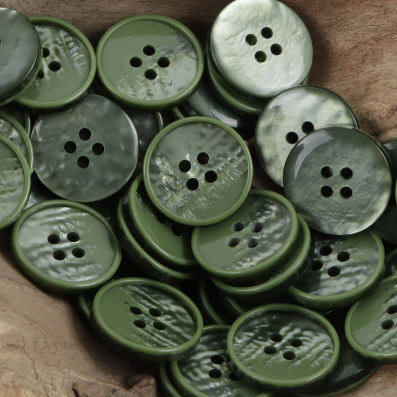 Green 4-hole resin sewing buttons, round with four holes