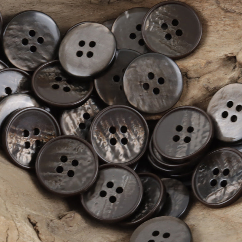 Mixed gray-toned 4-hole resin sewing buttons, round with four holes
