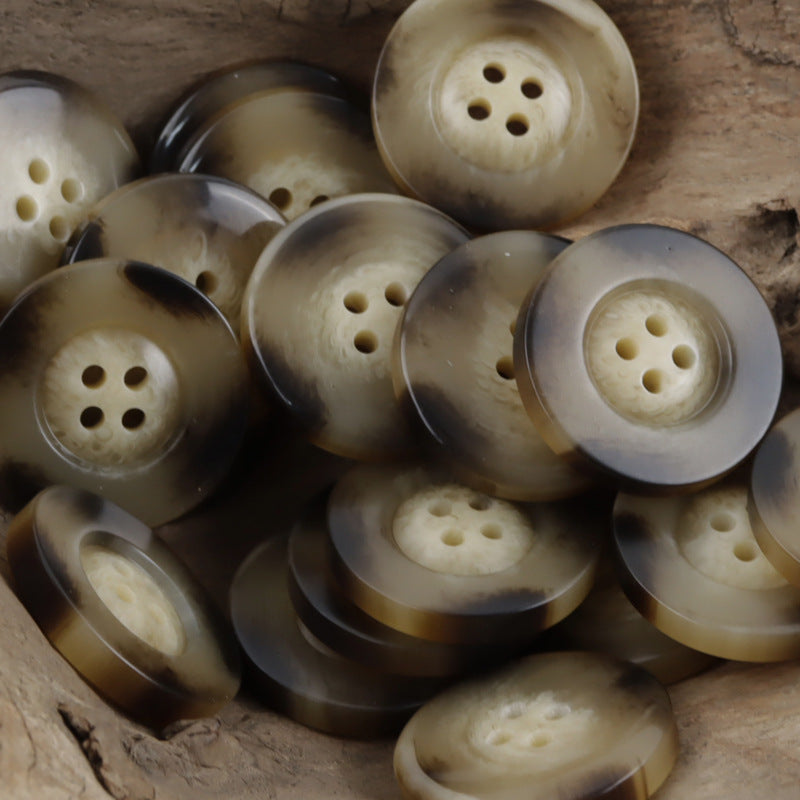 Mixed resin buttons in beige, cream and darker horn shades, 4-hole round design