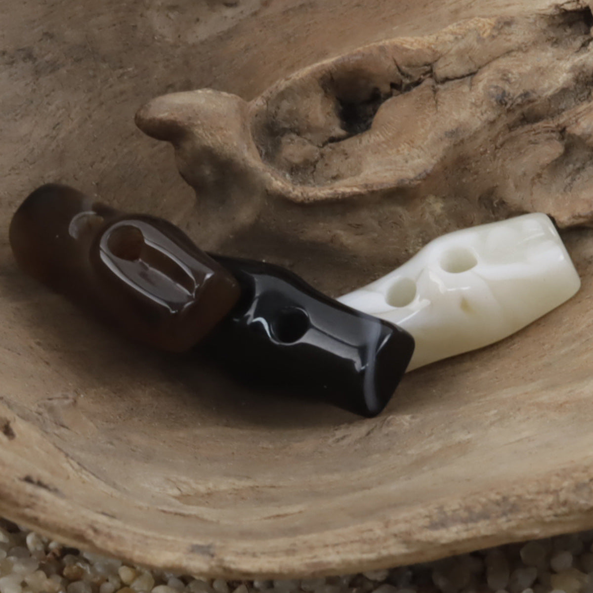 Bamboo knot imitation two-hole resin buttons, black and off-white