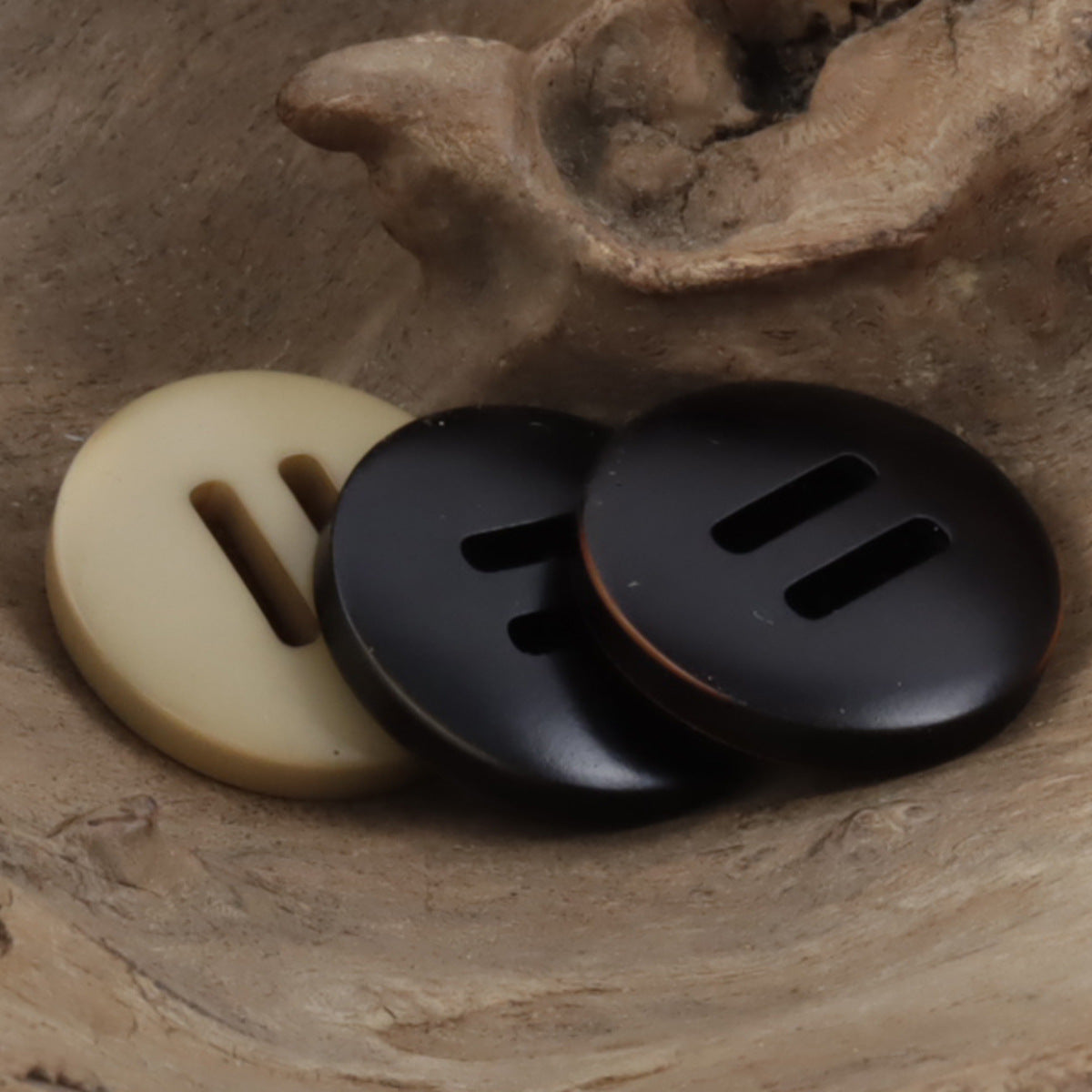Khaki and black long eyed three-step down resin slider buttons, 3-slot design