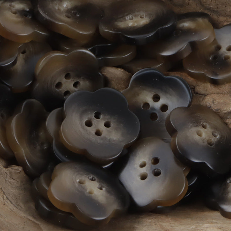 Dark amber resin flower buttons in brown-gray tones, each with 4 holes