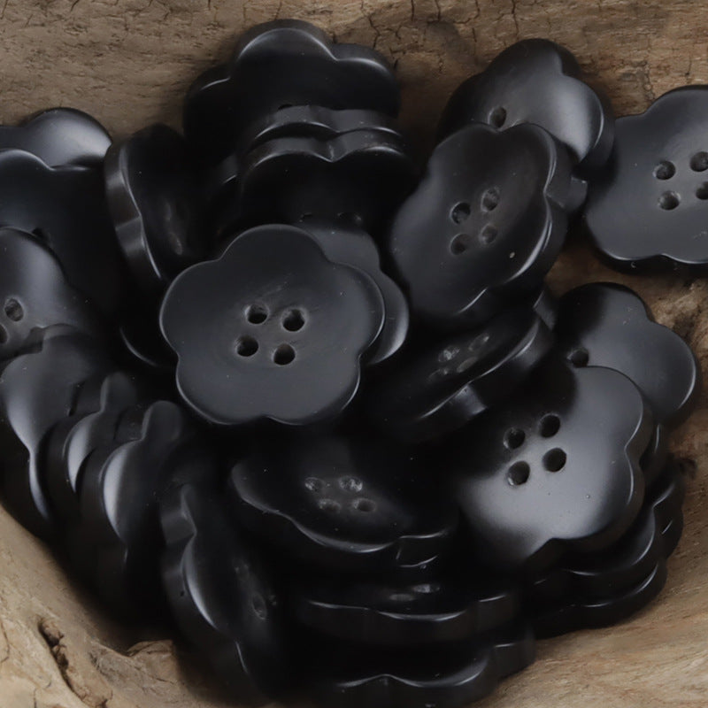 Black flower-shaped amber resin buttons, each with 4 holes, clustered set