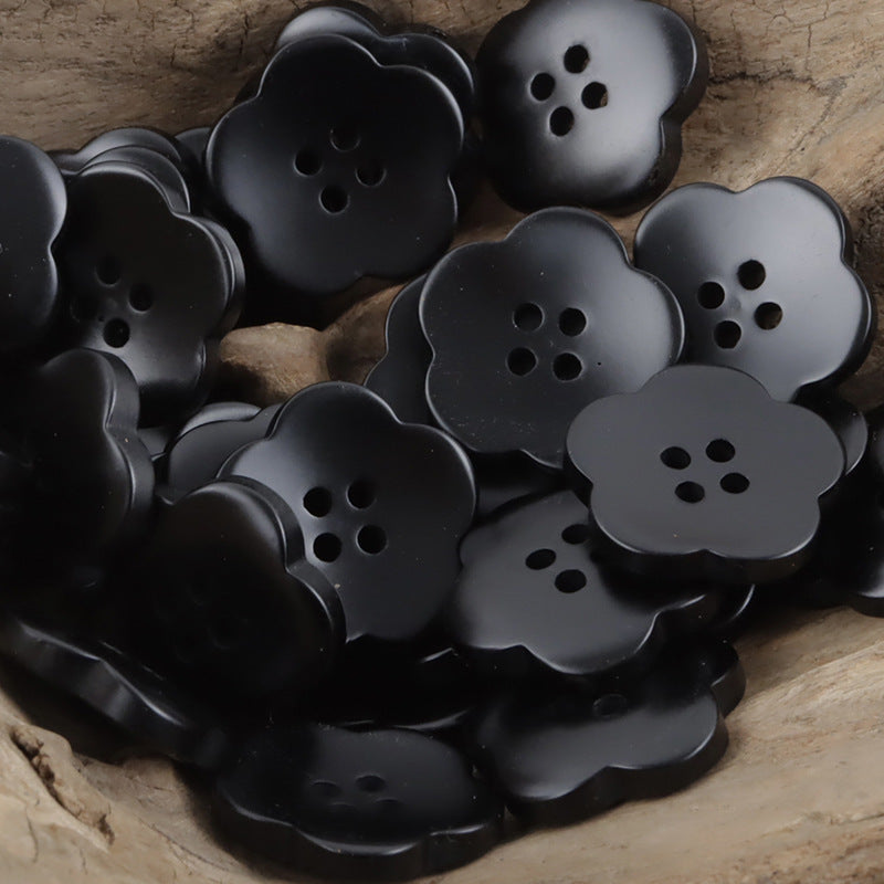 Black flower amber resin buttons with 4 holes, rounded petals and flat front
