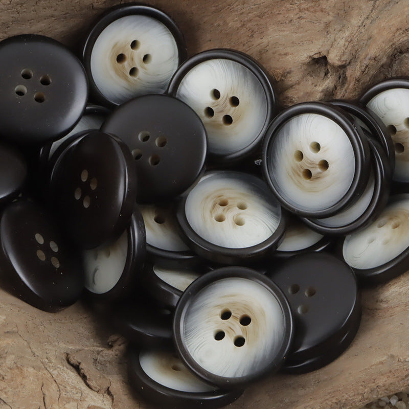 Set of children’s resin shirt buttons, round with 4 holes in white and dark