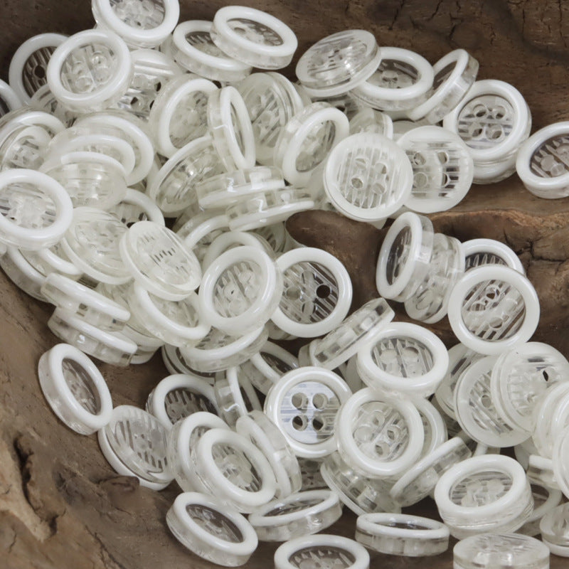11.5mm transparent resin 4-hole buttons in white translucent tones, multiple stacked pieces