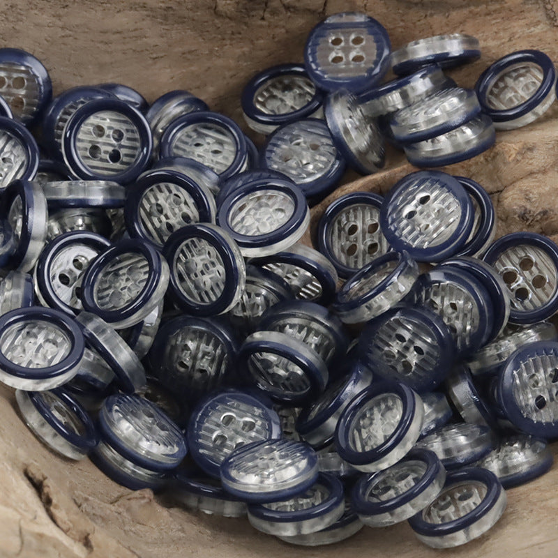 11.5mm transparent resin 4-hole buttons, many in dark navy/blue with clear centers