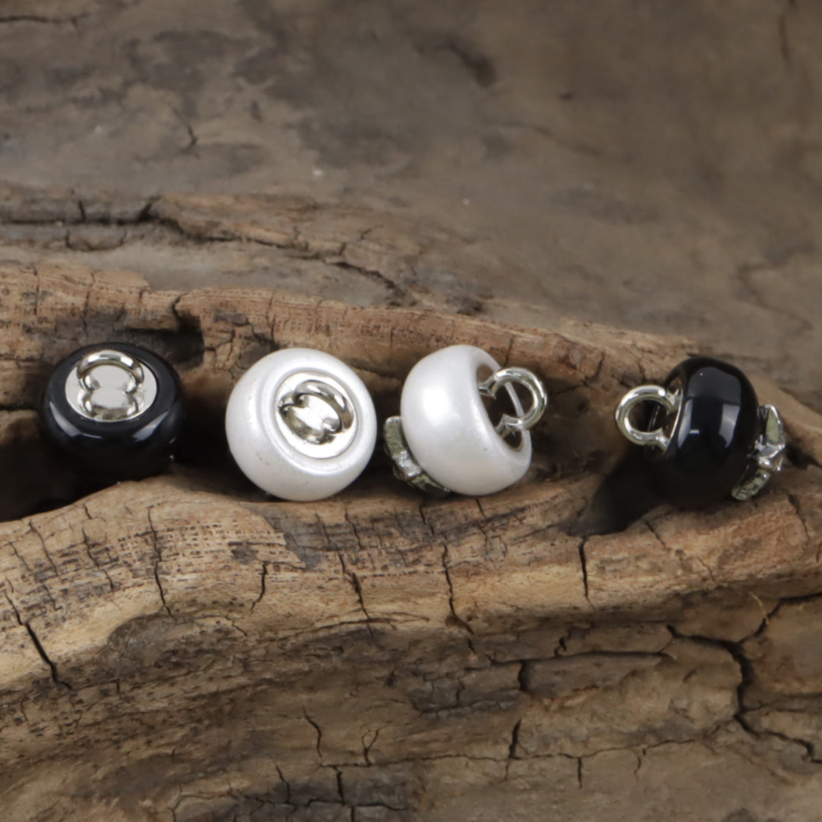 11.5mm starfish rhinestone buttons in white and black resin with silver loops