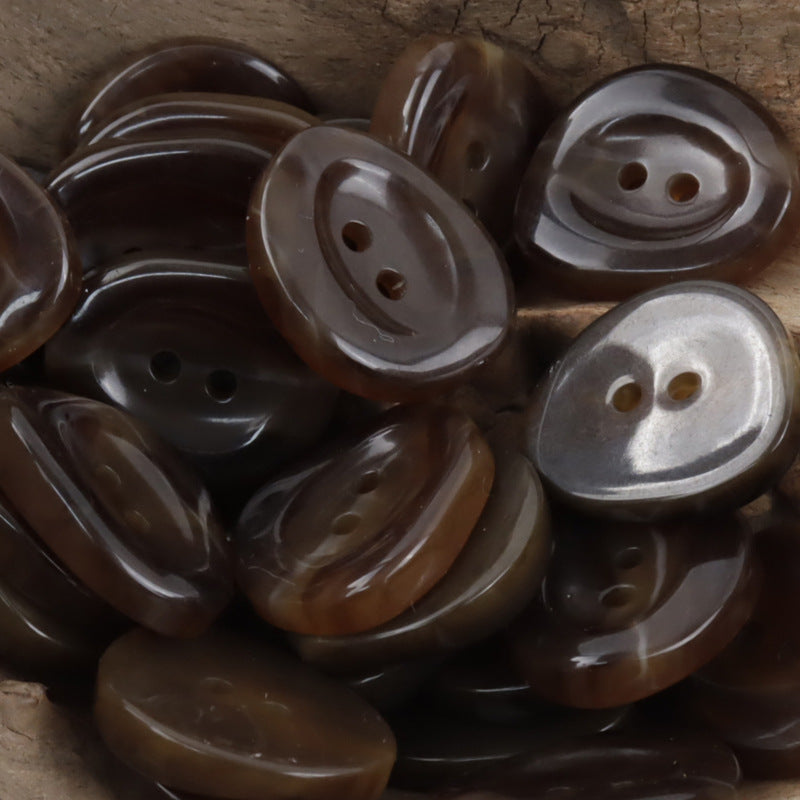Assorted 2-hole resin buttons in dark brown, charcoal and black tones, 10pcs