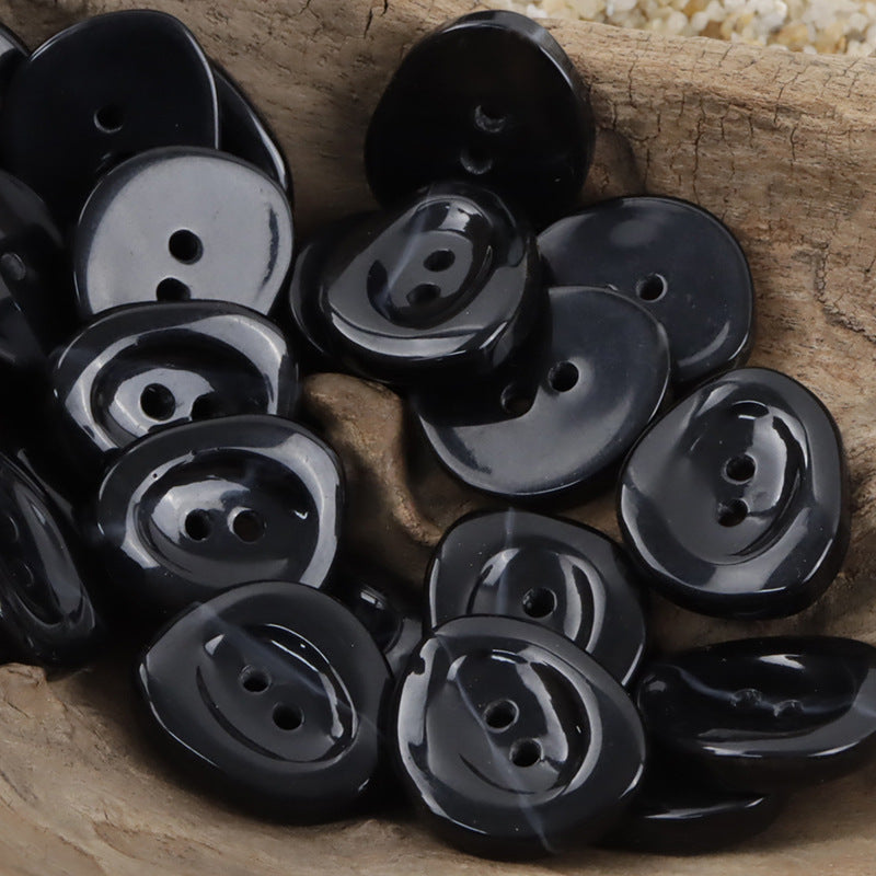 Irregular 2-hole resin buttons in black, glossy, 10pcs
