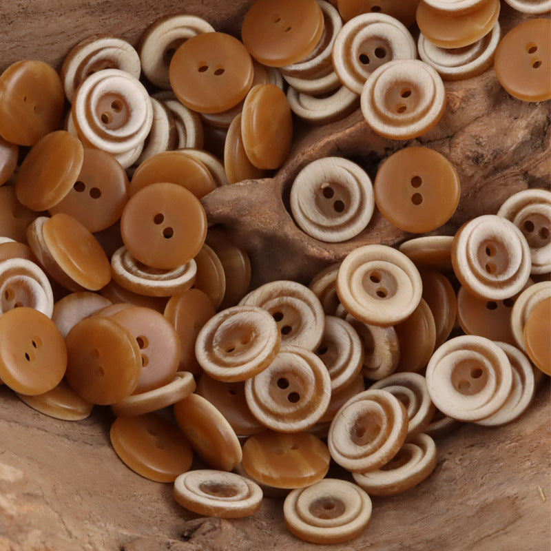 Coffee-to-brown 2-hole resin gradient crescent buttons, flat round front