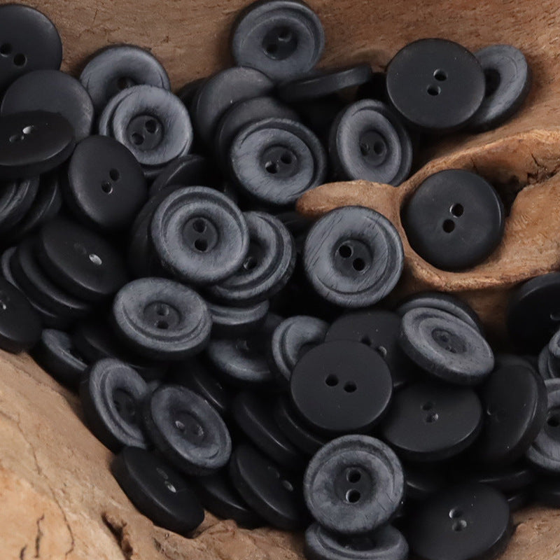 Black 2-hole resin gradient crescent buttons, matte round faces