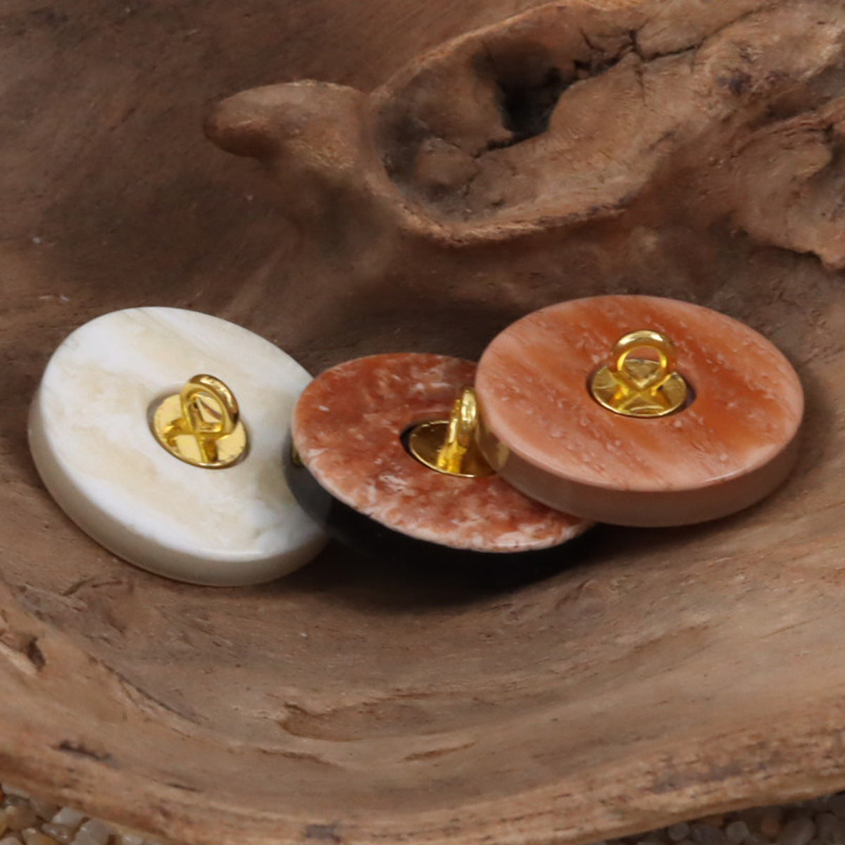 Round resin curtain buttons in beige yellow with gold metal shanks