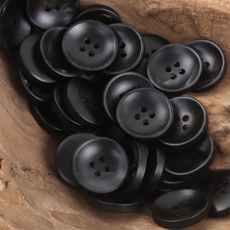 Dark gradient hazy round resin 4-hole buttons, close pile