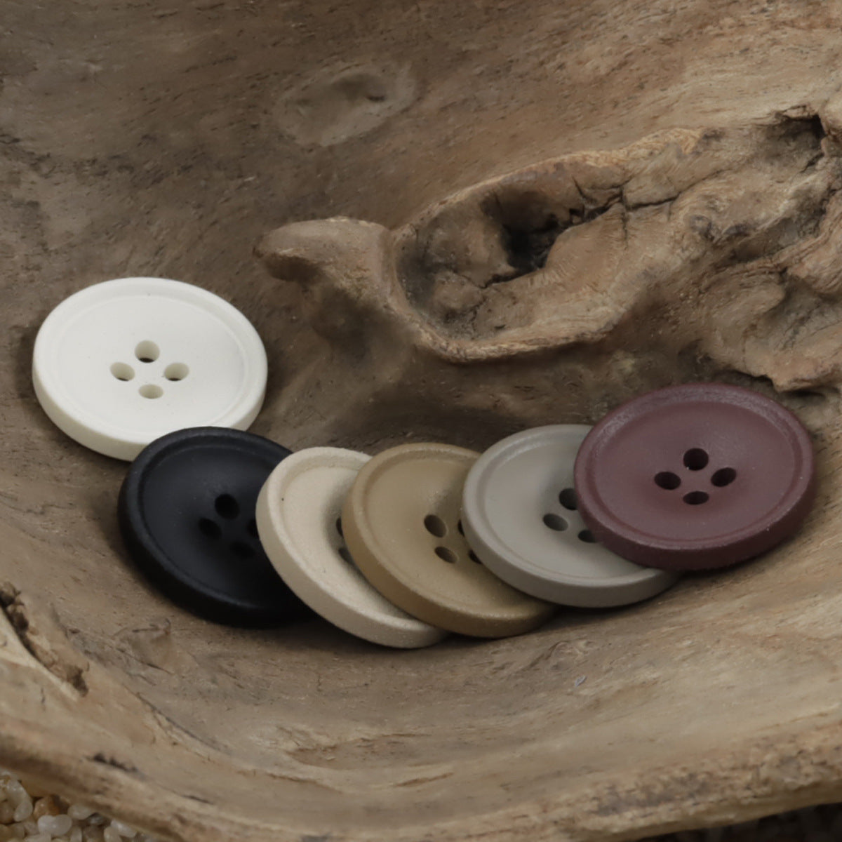 Matte resin coat buttons in mixed shades with round 4-hole fronts