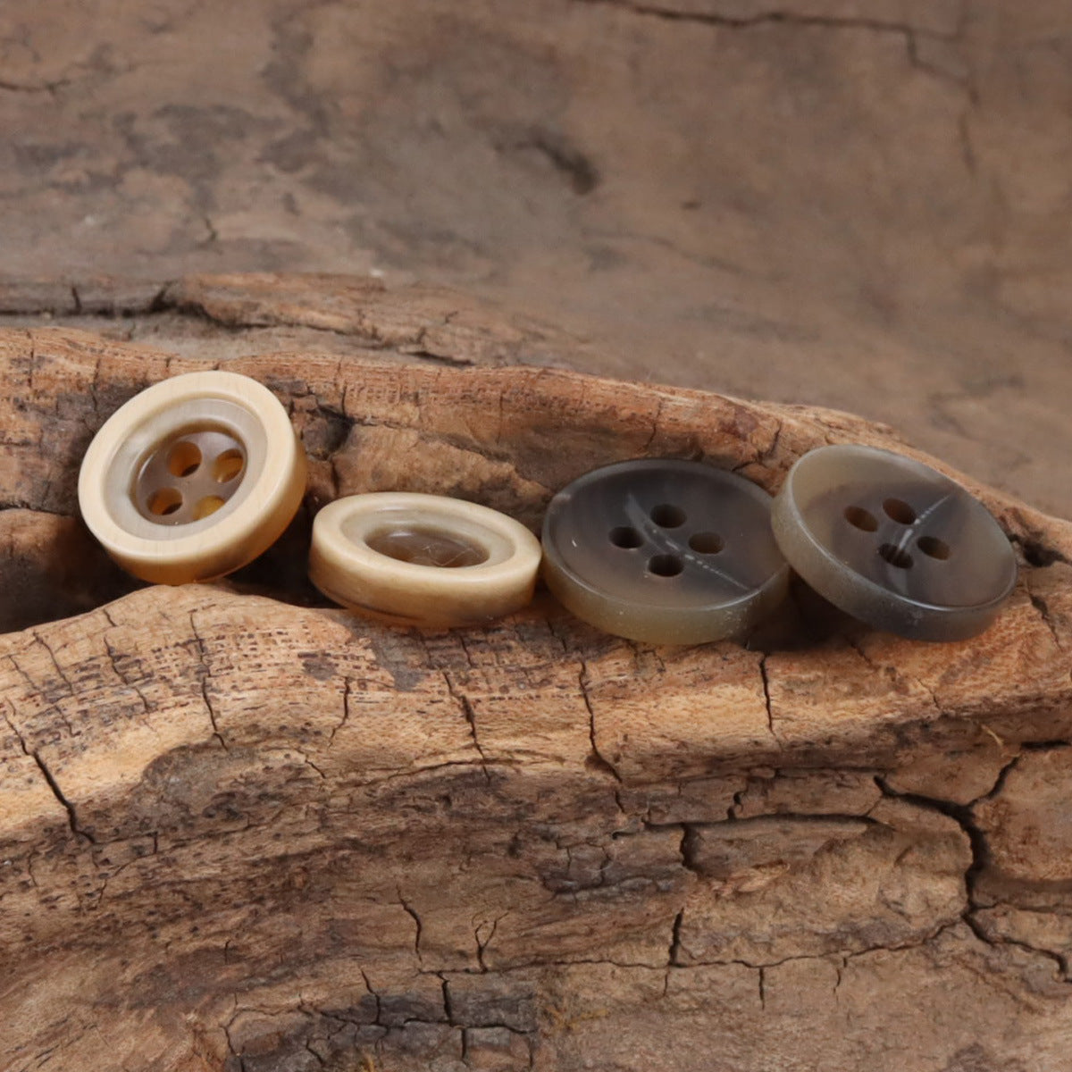 Two-tone resin buttons, 4-hole, amber and coffee tones in a row