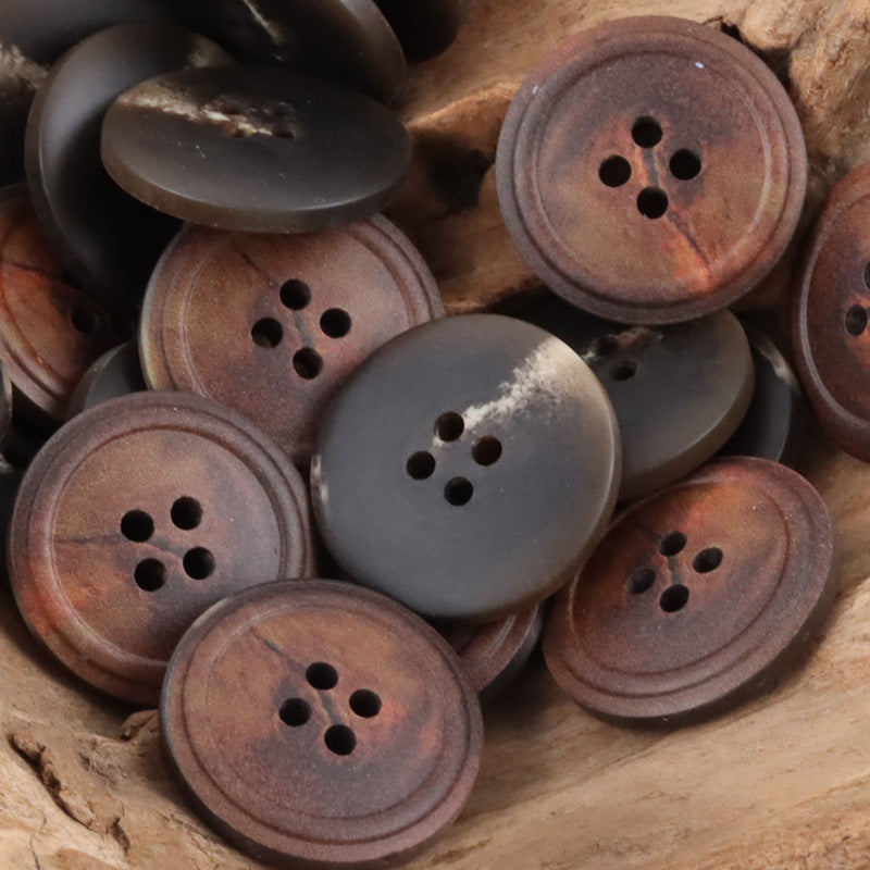 Round 4-hole vintage resin buttons in brown and coffee tones with some dark gray