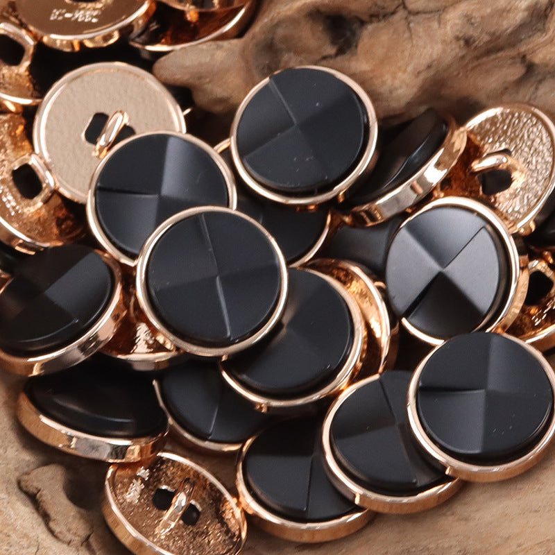 Dark navy/black round geometric resin metal buttons with gold-tone rims