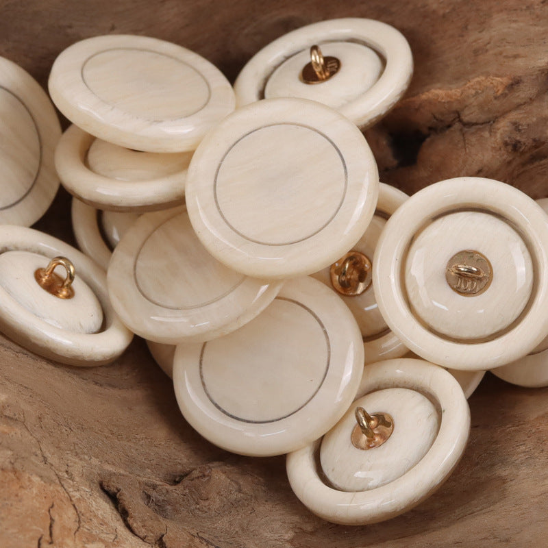 White resin buttons with metal shanks, round sweater/cardigan style, 4-hole look