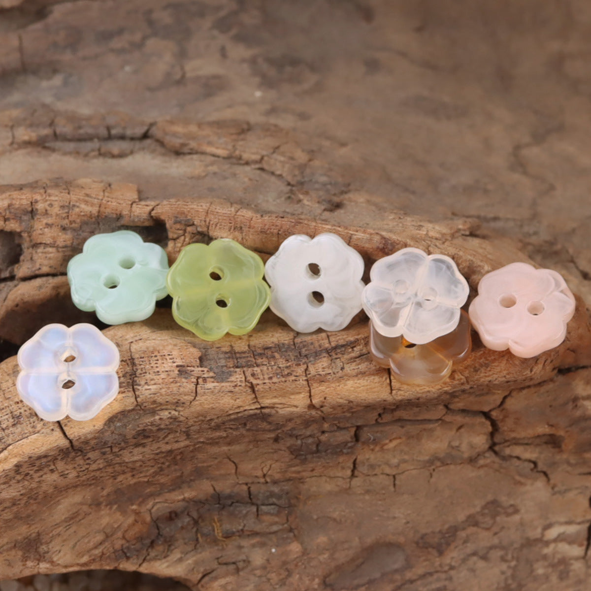 Cherry blossom resin buttons in mint, light lime, white, pale blue, and blush pink