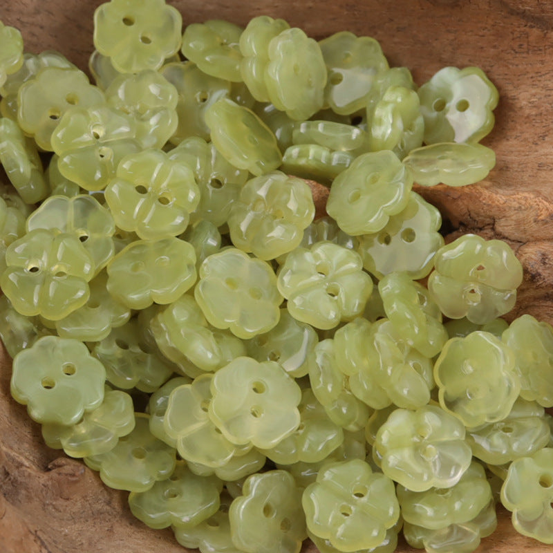 Light green cherry blossom resin buttons, translucent with two holes