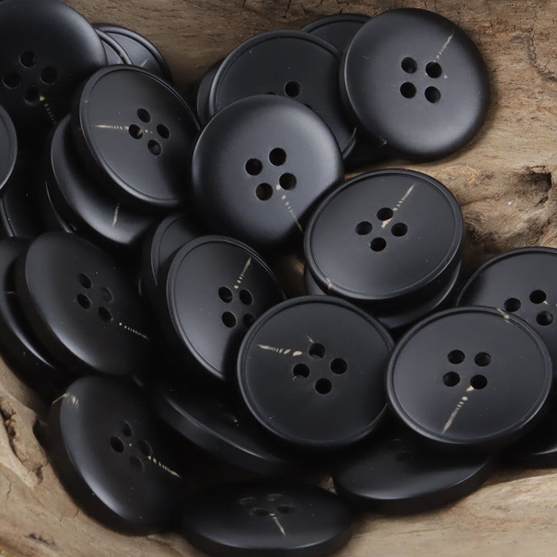 Dark charcoal resin buttons, rounded 4-hole fronts, assorted angles in set