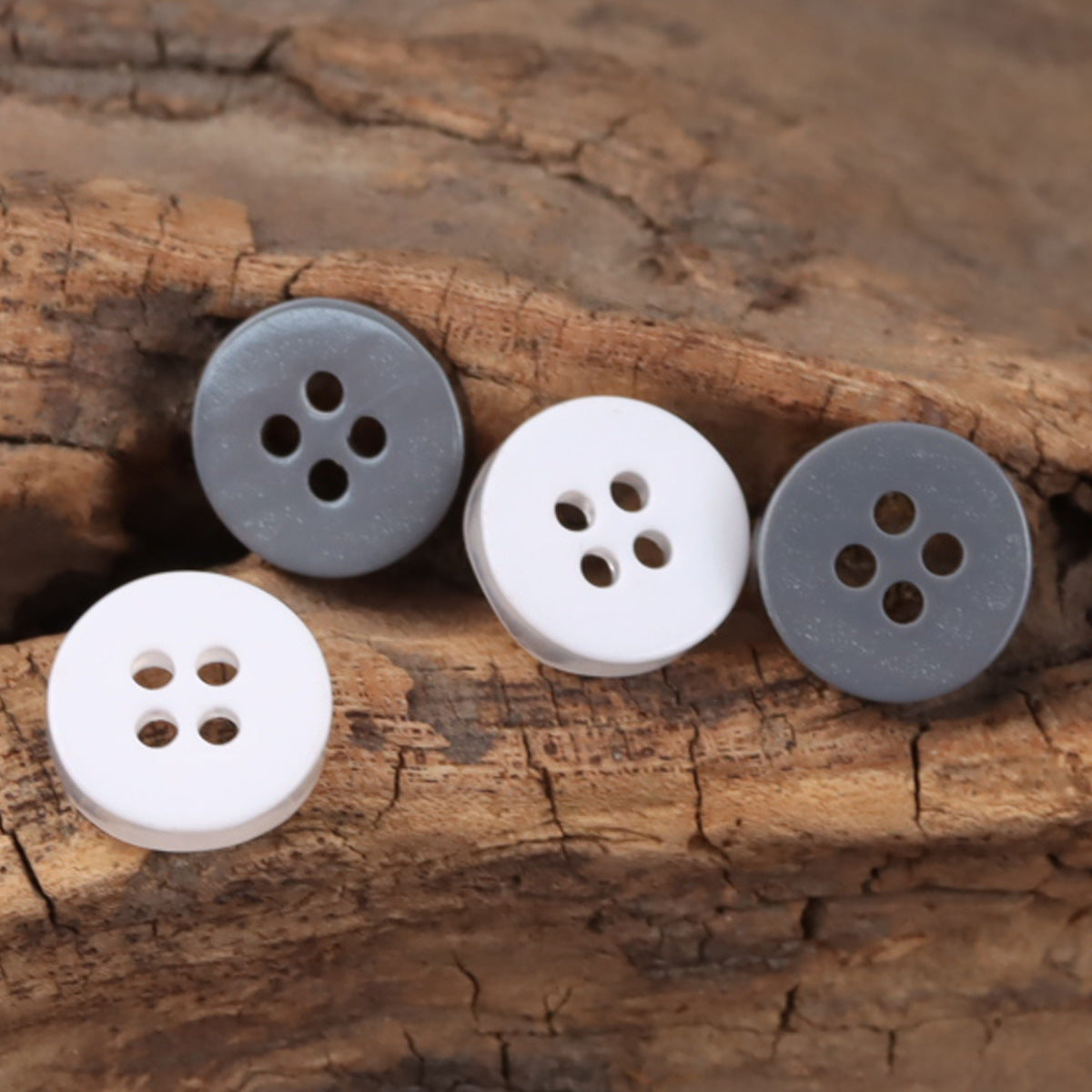White and gray glitter curved resin 4-hole buttons, round, glossy