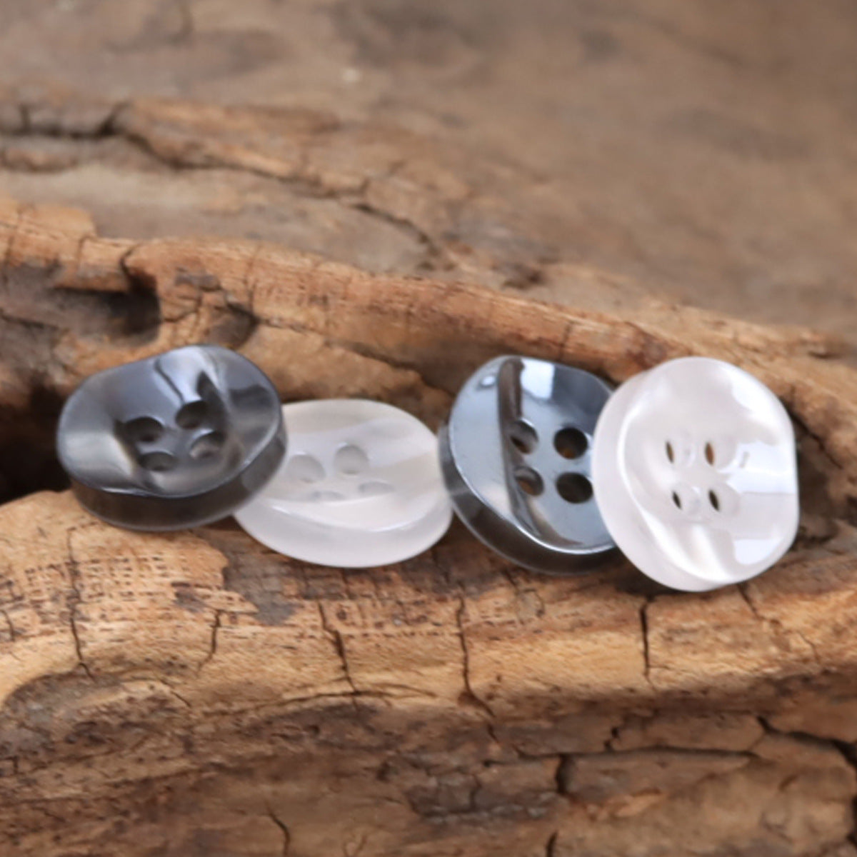 Curved resin shirt buttons, round 4-hole, white and dark gray glitter